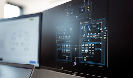 Two monitors display a running security program (Photo)